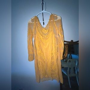 Mustard yellow lace dress.